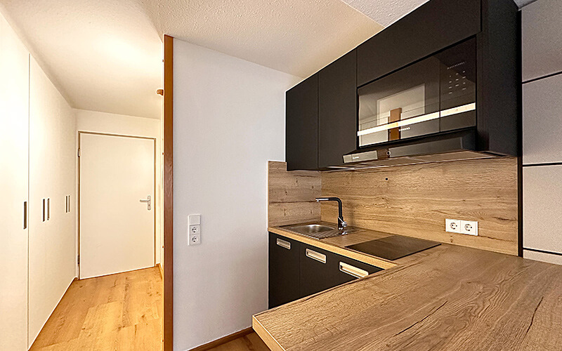 Verkauf 1-Zimmer-Apartment im München, City, Museumviertel: Kochen. Quartiere Ulrike Küpper.